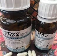 Glas med TRX2 piller